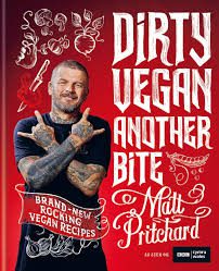 Front cover of Matt Pritchard's book 'Dirty Vegan Another Bite' shows Matt posing.
